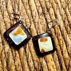 Coconut shell in diamond shape accented with mother of pearl